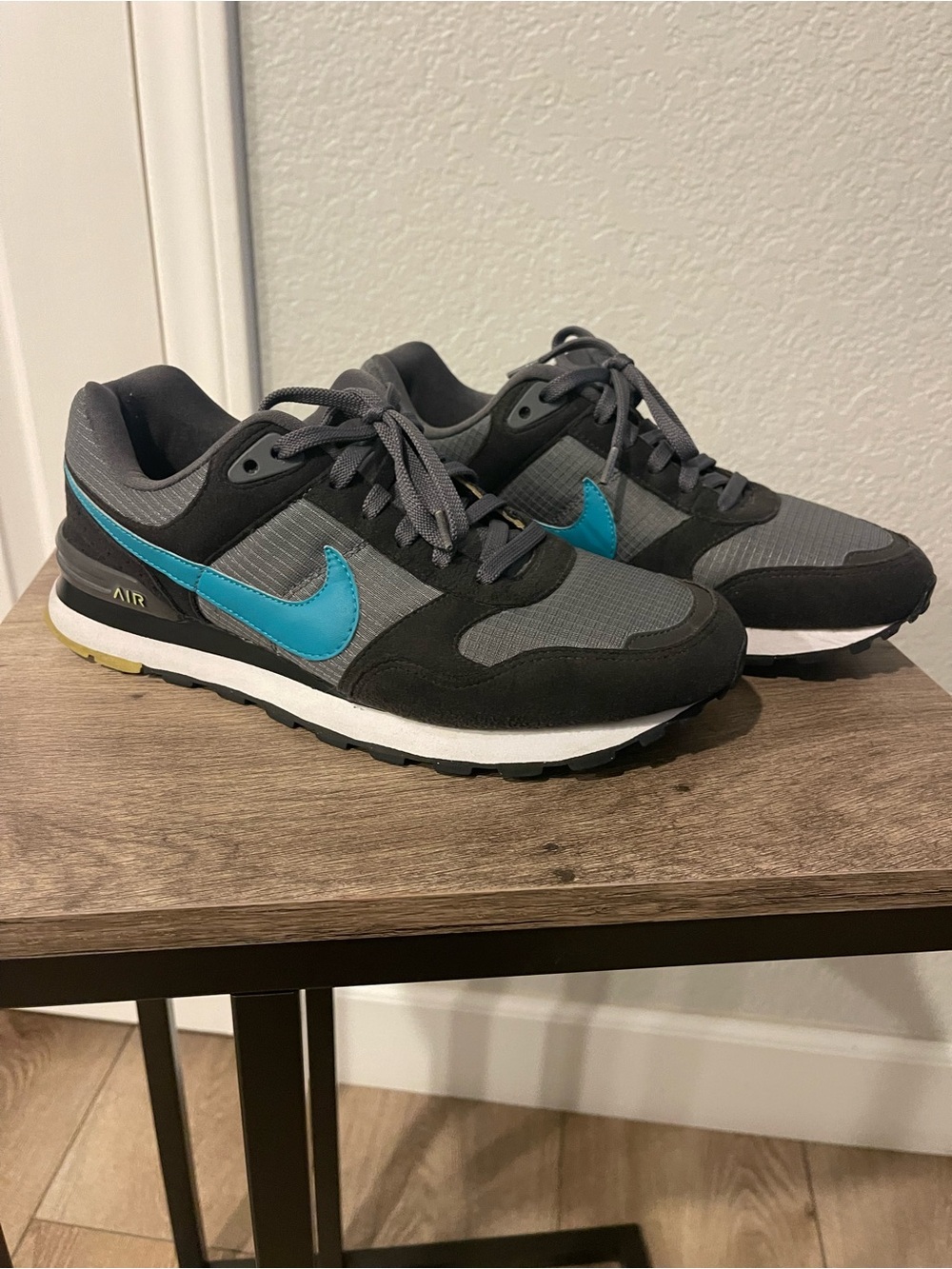 Nike women’s Gray & Teal Sneakers
